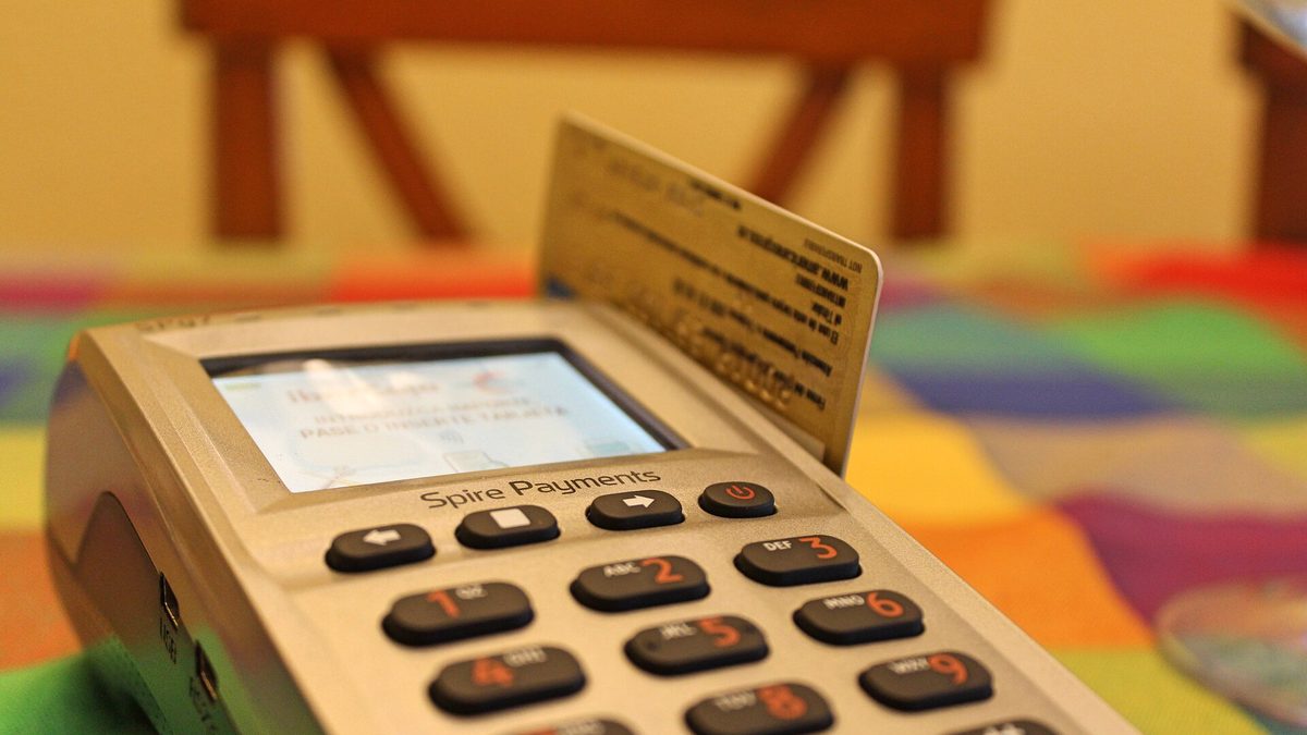 Card payment terminal at a shop counter